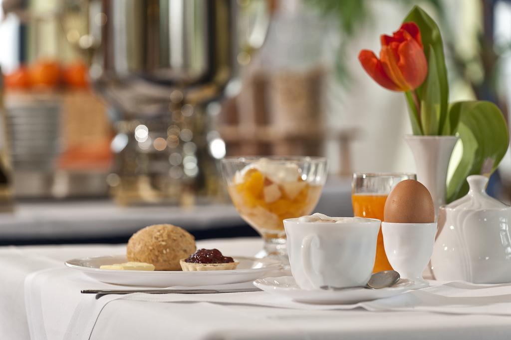 City Inn Hotel Лейпциг Ресторан фото